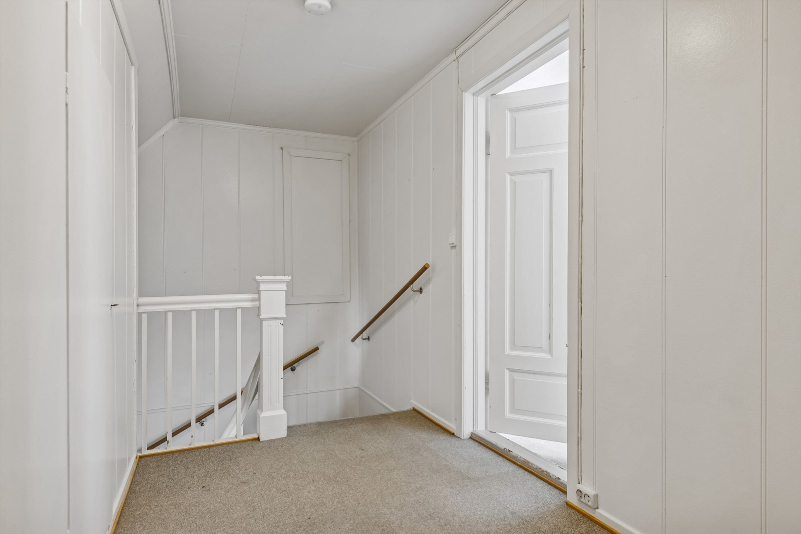 Gang i andre etasje som gir tilgang til bad og soverom. Galleribilde