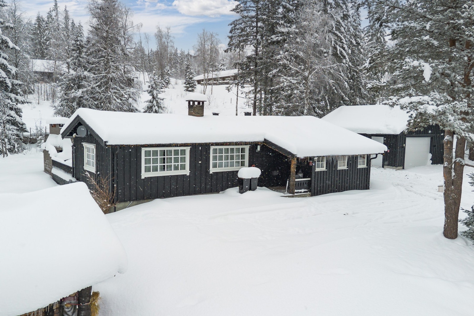 Innbydende inngangsparti som ønsker deg velkommen til fjells Galleribilde