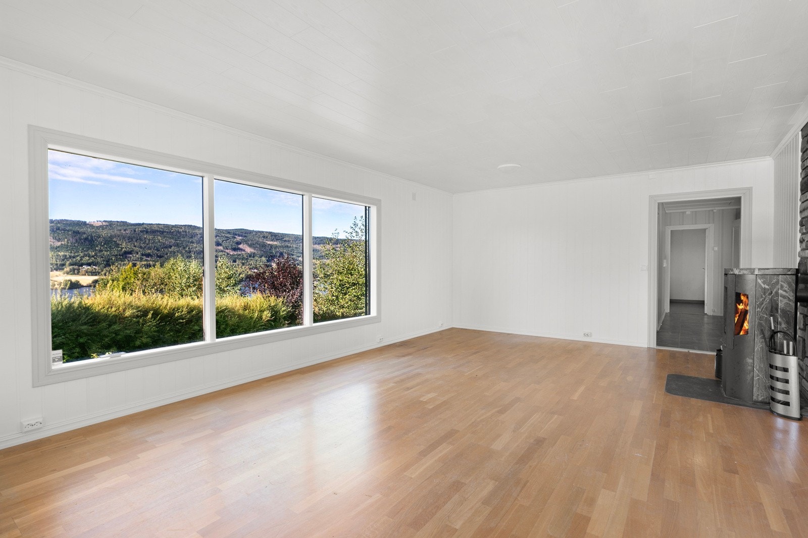 Stue med parkett på gulv. Galleribilde