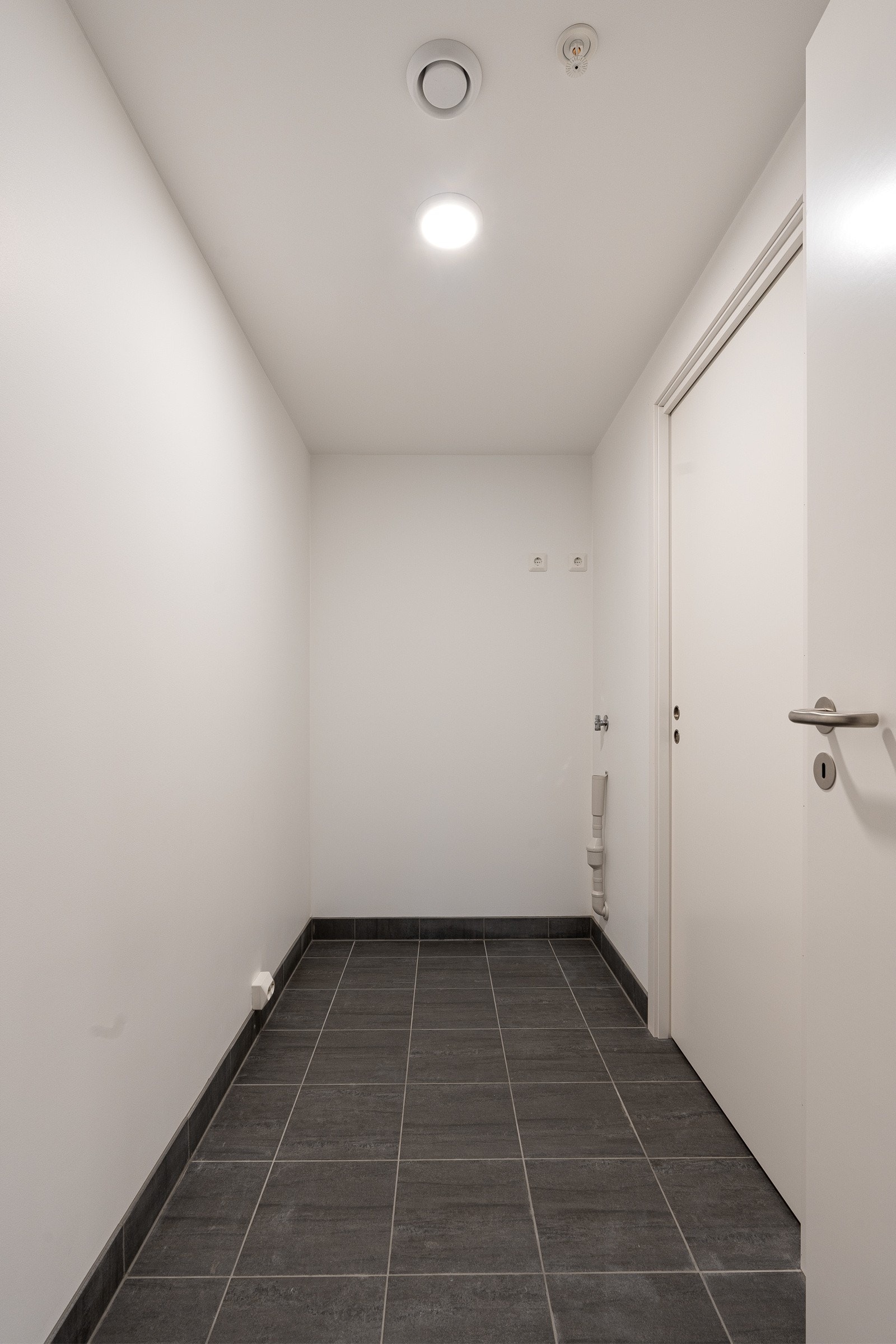 Det er også separat vaskerom/bod i leiligheten. Galleribilde