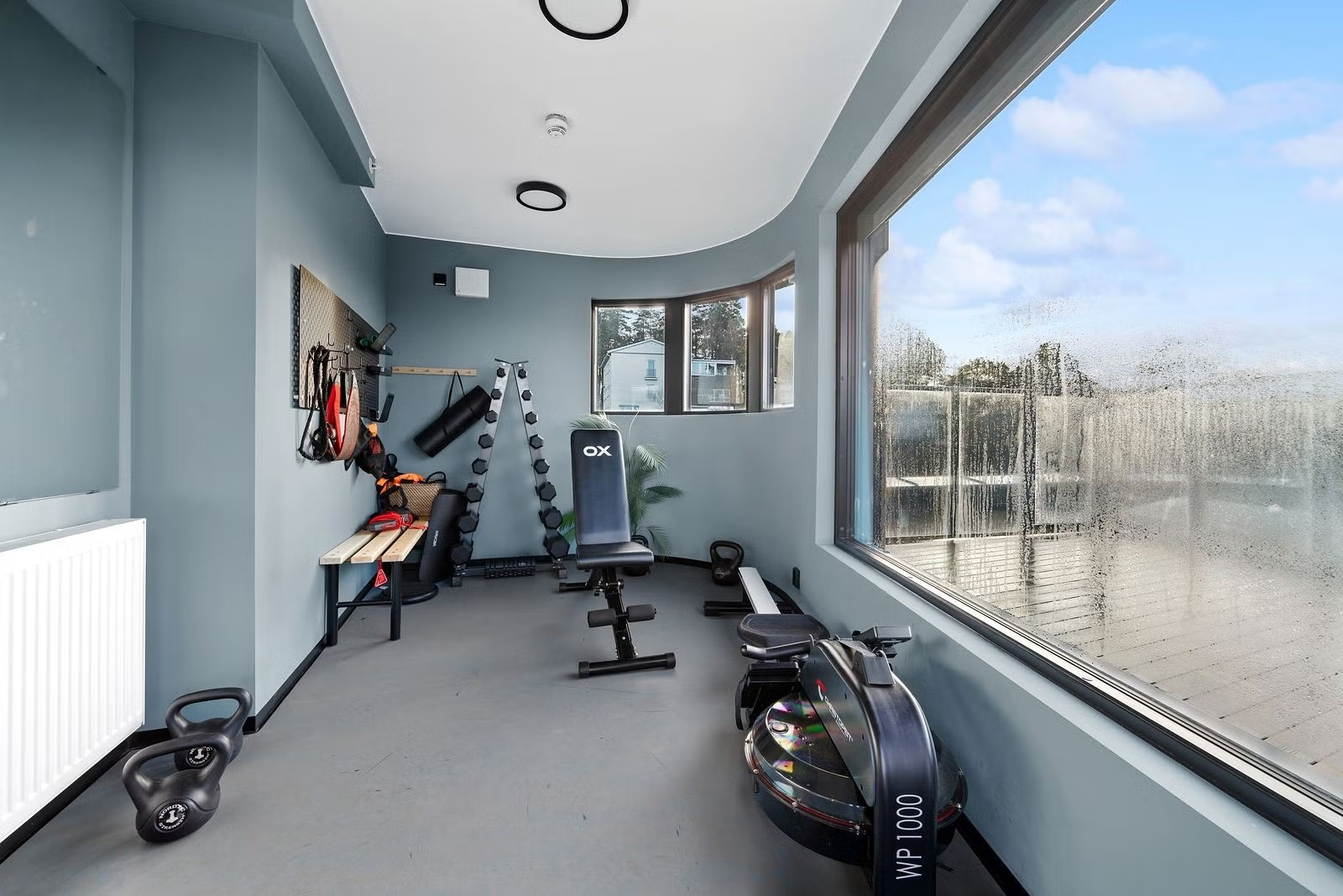 På et av byggets andre takterrasser har beboerne også tilgang til treningsrom. Galleribilde