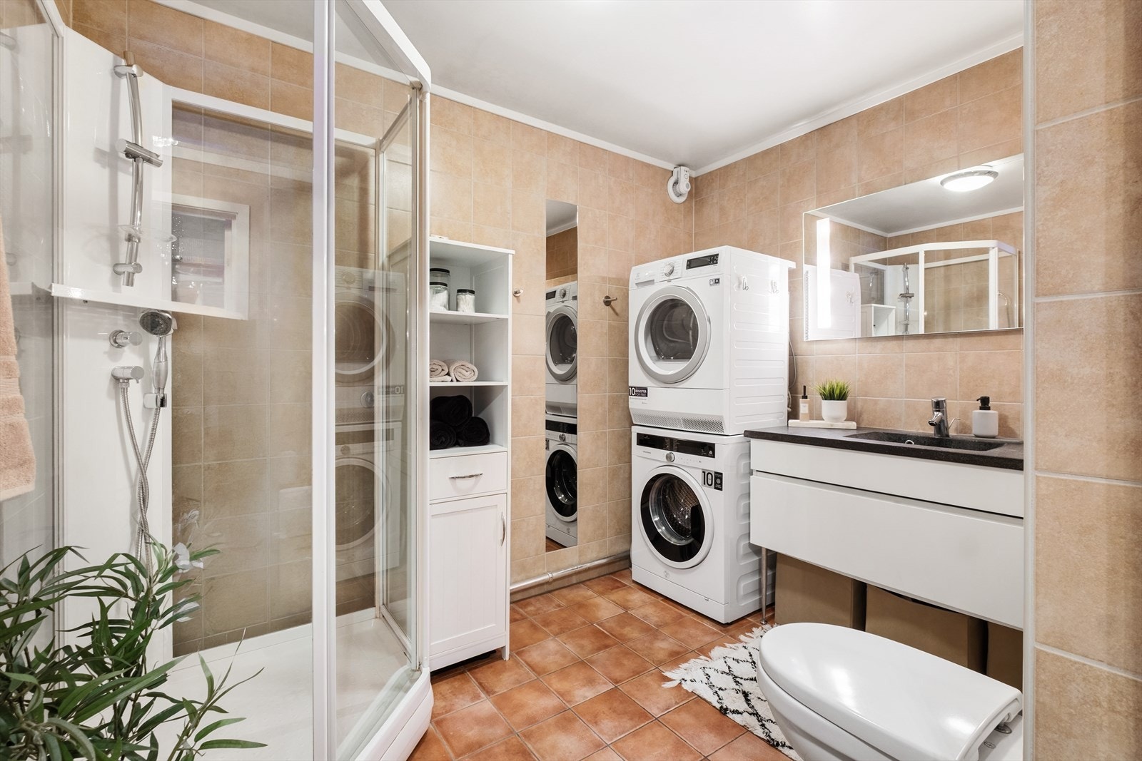 Flislagt bad med varme i gulv. Galleribilde