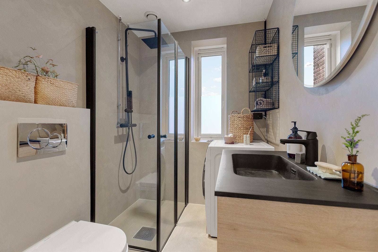 Badet fremstår som delikat og moderne med gjennomført uttrykk og gode materialvalg. Galleribilde