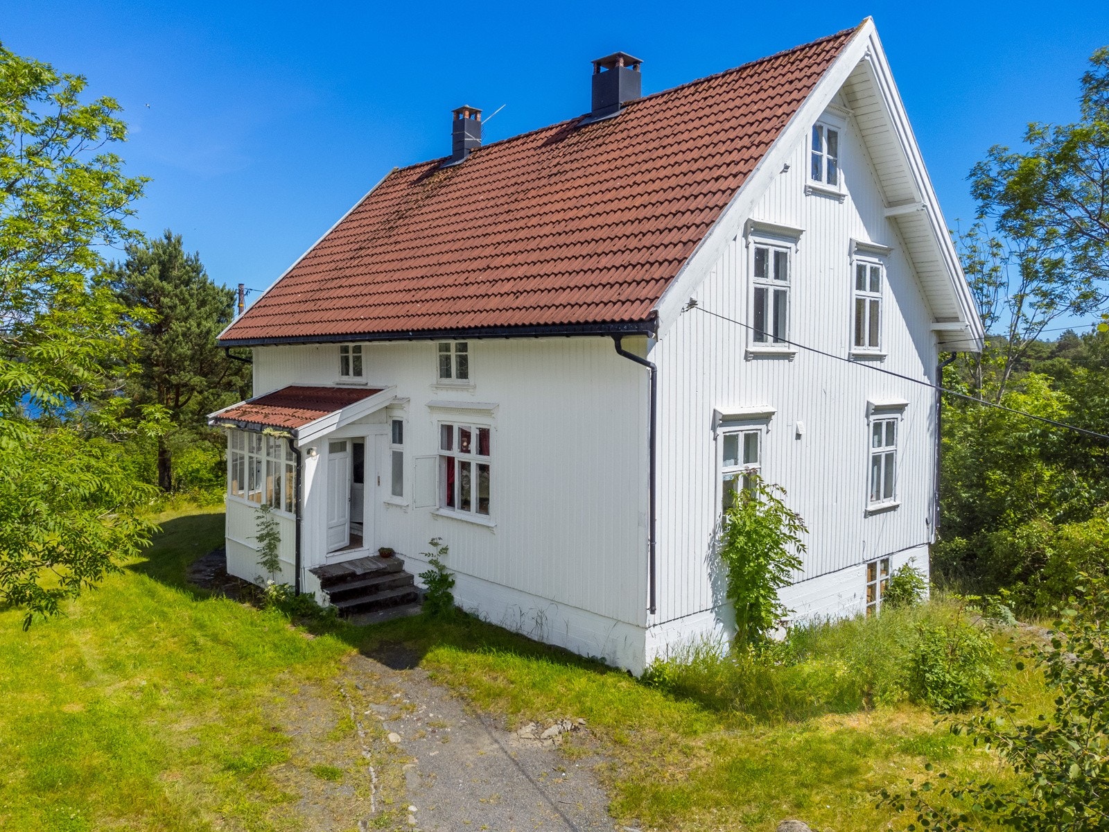 Eiendommen består av 2 boliger. Her er Breivikveien 23 fra 1910? Galleribilde