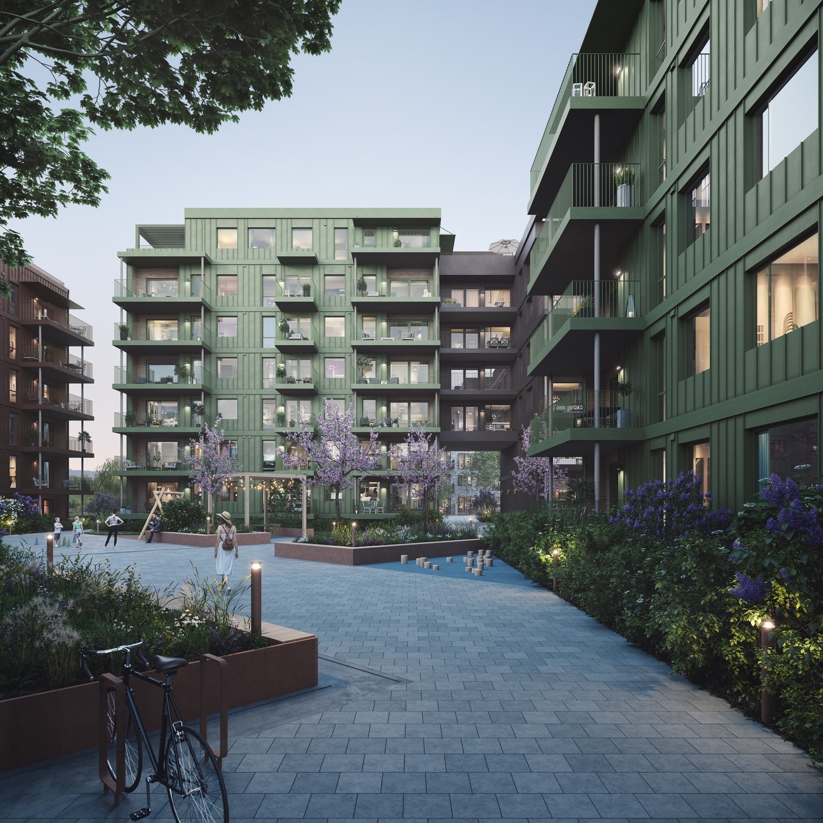 Området har pent opparbeidet tun og grøntareal mellom byggene. Galleribilde