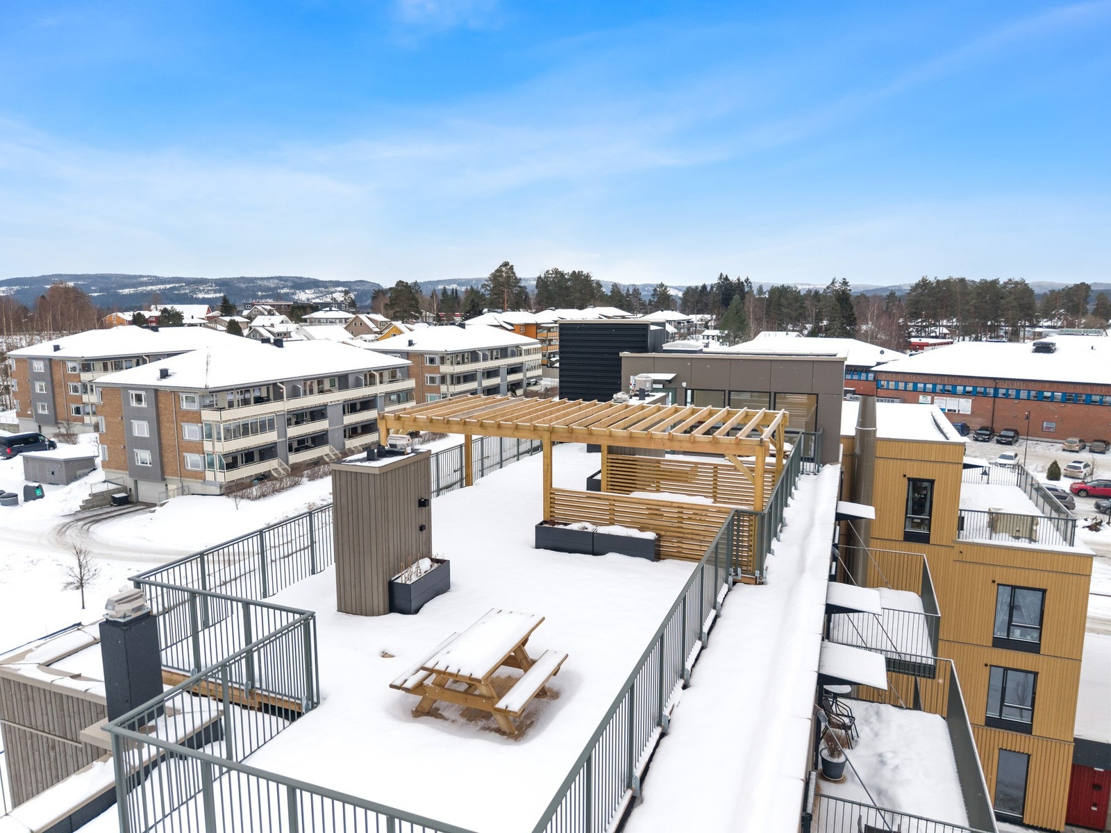 Blokken har en stor felles takterrasse for alle beboerne. Galleribilde