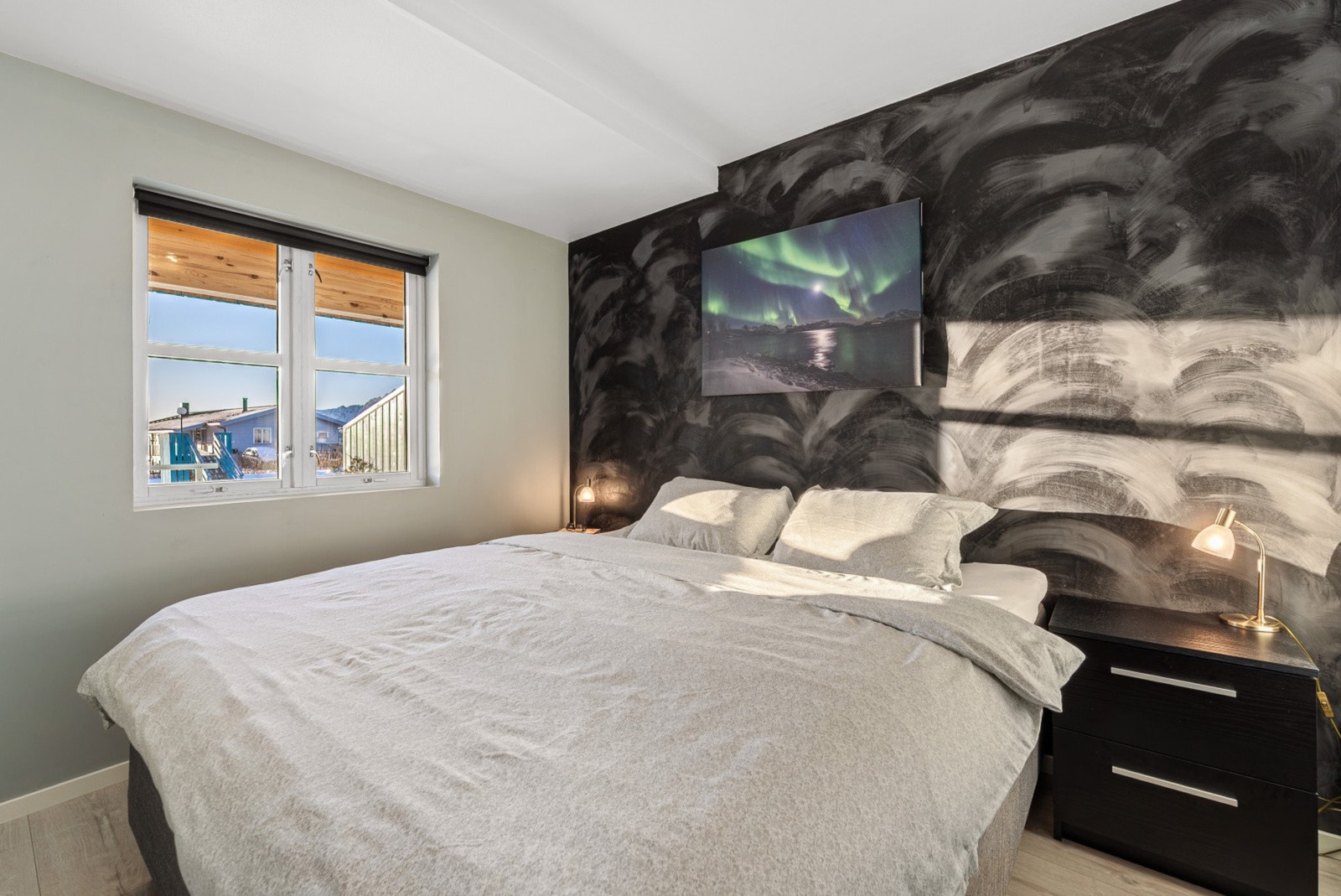 Soverommet holder samme moderne stil som resten av leiligheten. Galleribilde