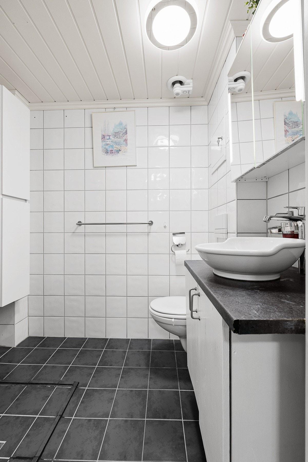 Flislagt bad med gulvvarme. Galleribilde