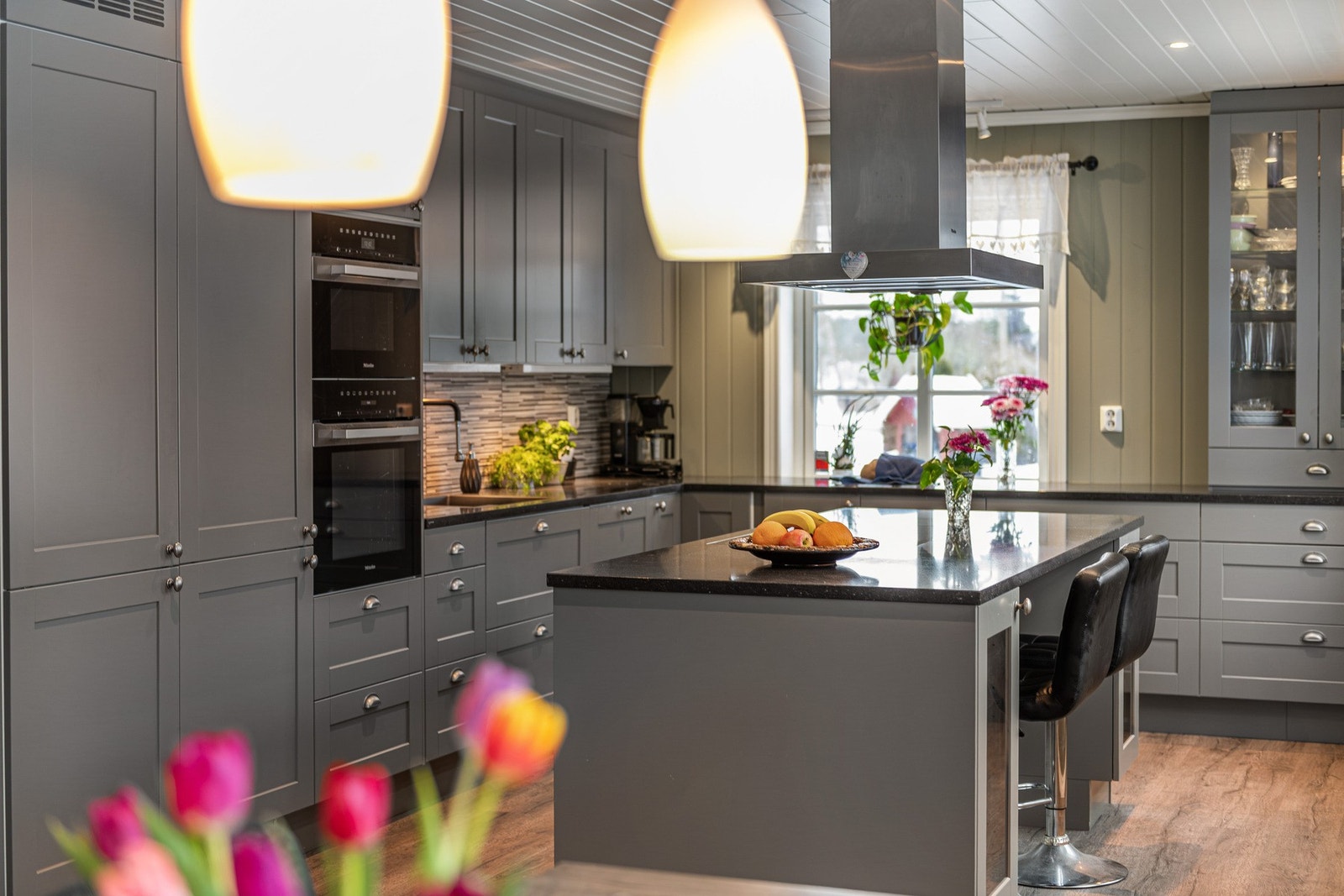 Kjøkkenet er hjemmets hjerte i denne boligen. Galleribilde