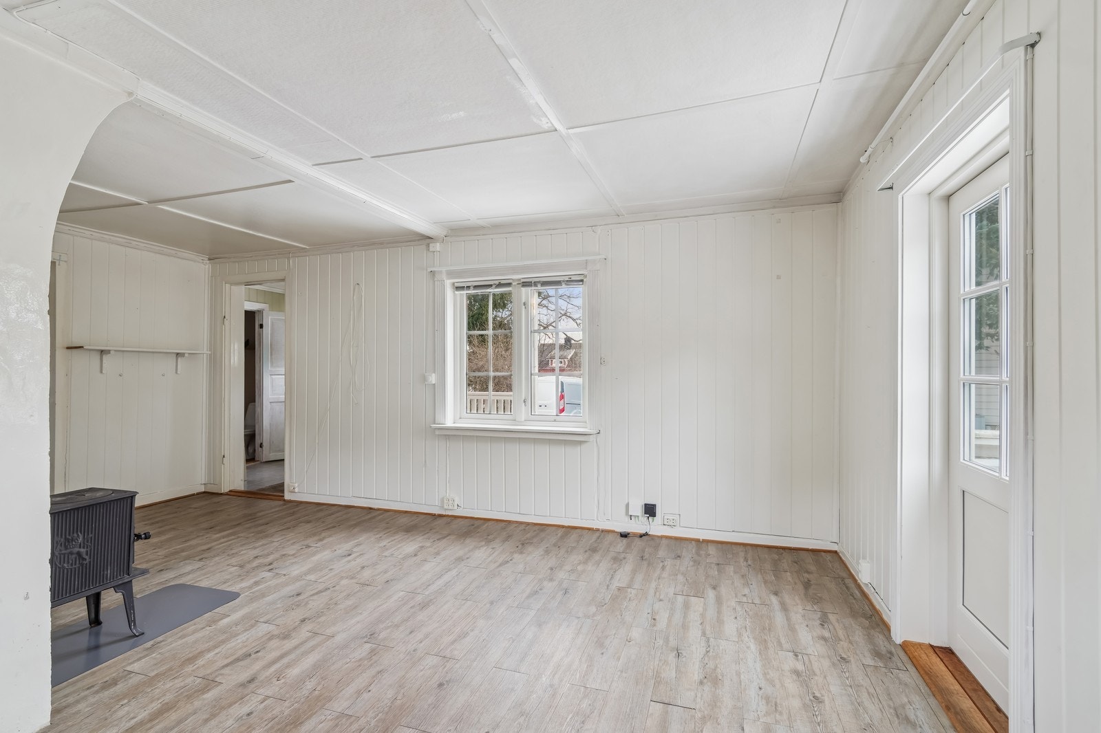 Lys stue med møbleringsmuligheter Galleribilde