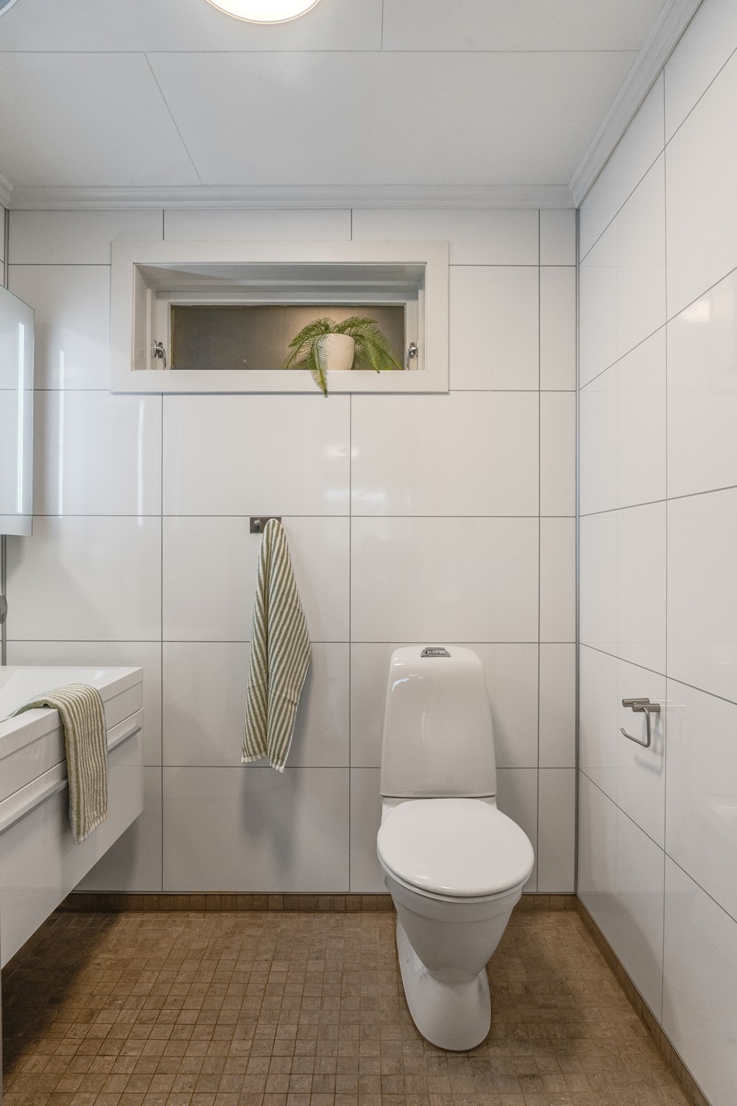 De stilige gulvflisene gir rommet et ekstra særpreg. Galleribilde