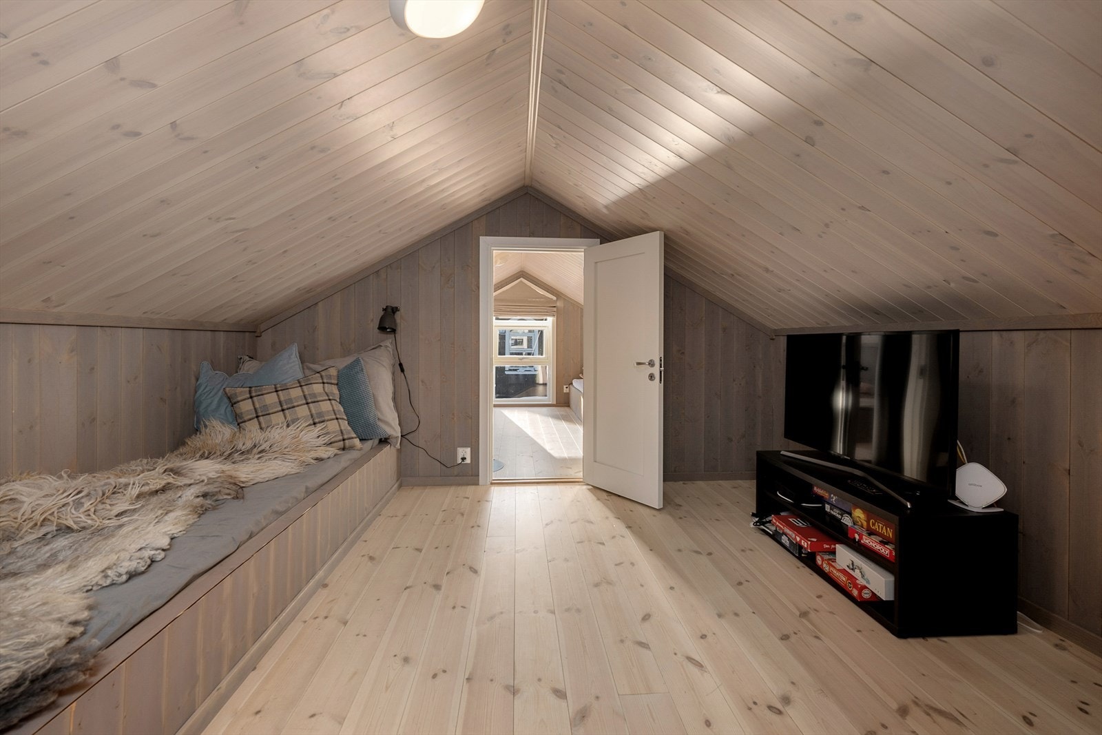 Et fleksibelt areal som kan innredes som en ekstra TV-stue eller soveplass. Galleribilde