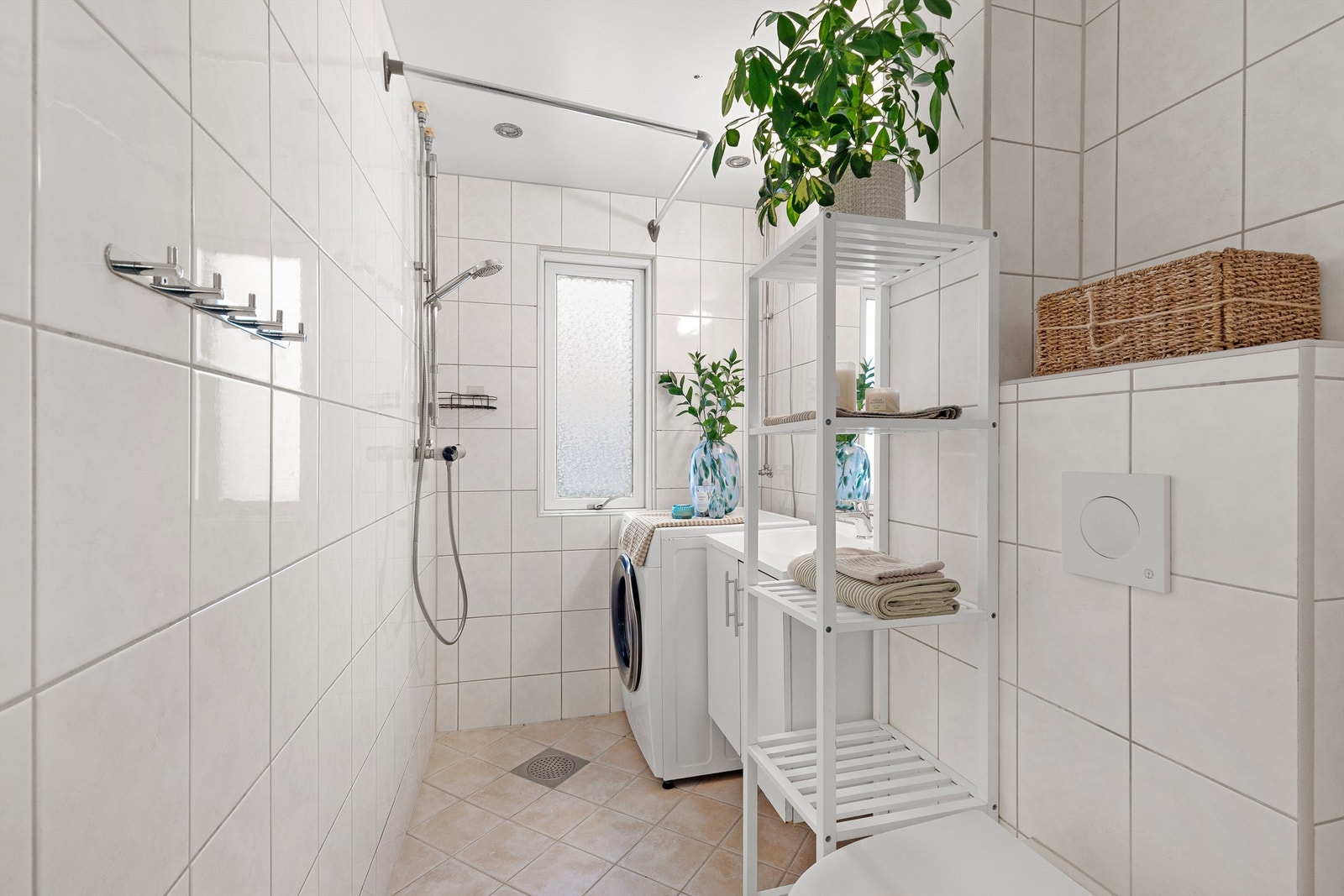 Pent flislagt bad som ble pusset opp i regi av borettslaget i 2011 Galleribilde