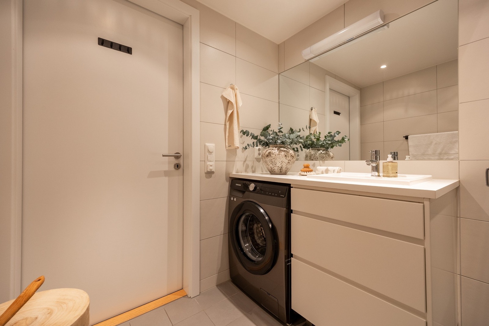 Badet har opplegg for vaskemaskin. Galleribilde