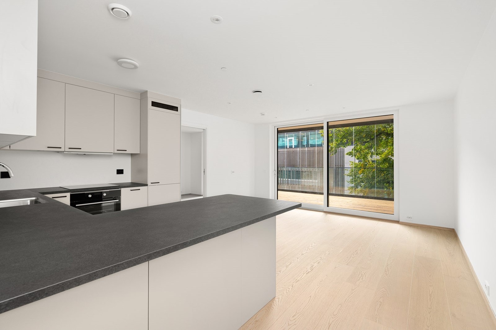 Åpen stue kjøkken løsning Galleribilde