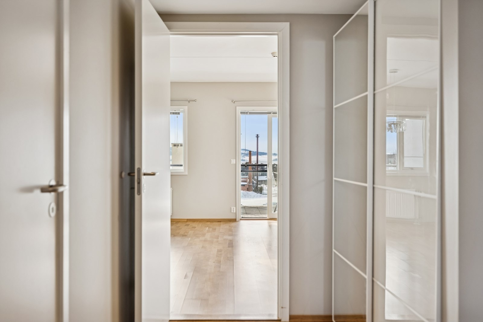 Fra gangen ledes du videre inn mot leilighetens sosiale sone. Galleribilde