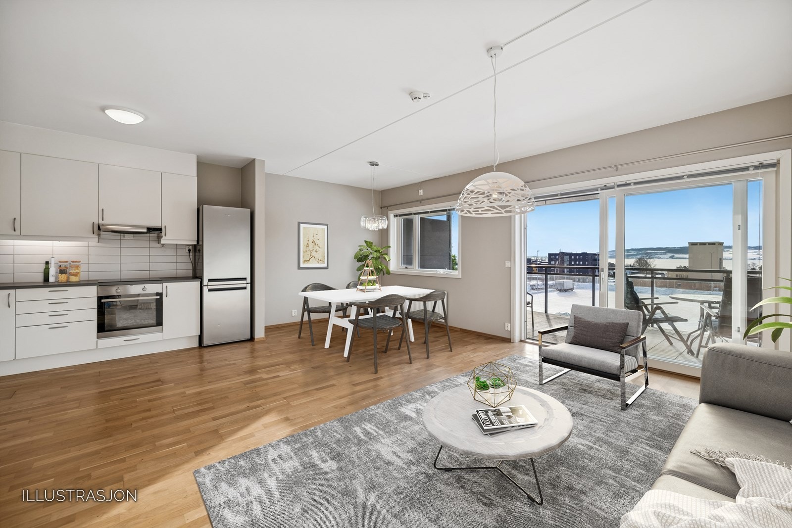 Kjøkkenet er en integrert del av oppholdsrommet, perfekt for sosiale sammenkomster. Galleribilde