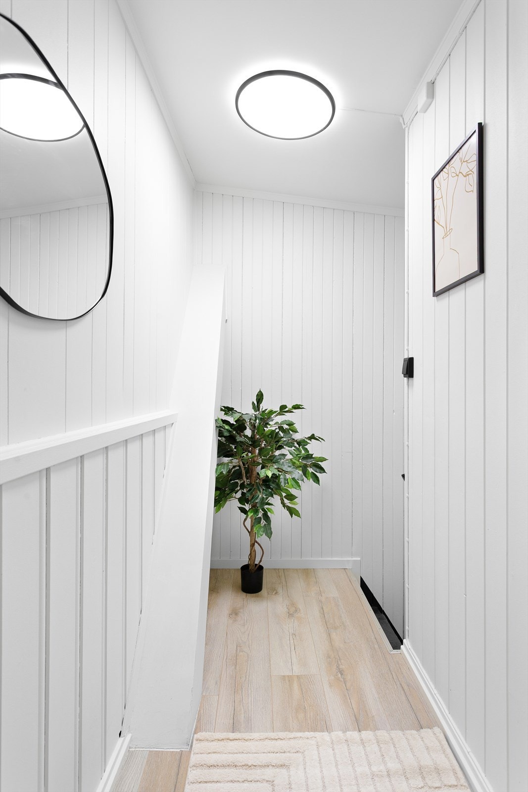 Trapperommet binder etasjene sammen og leder opp til soveavdelingen. Galleribilde