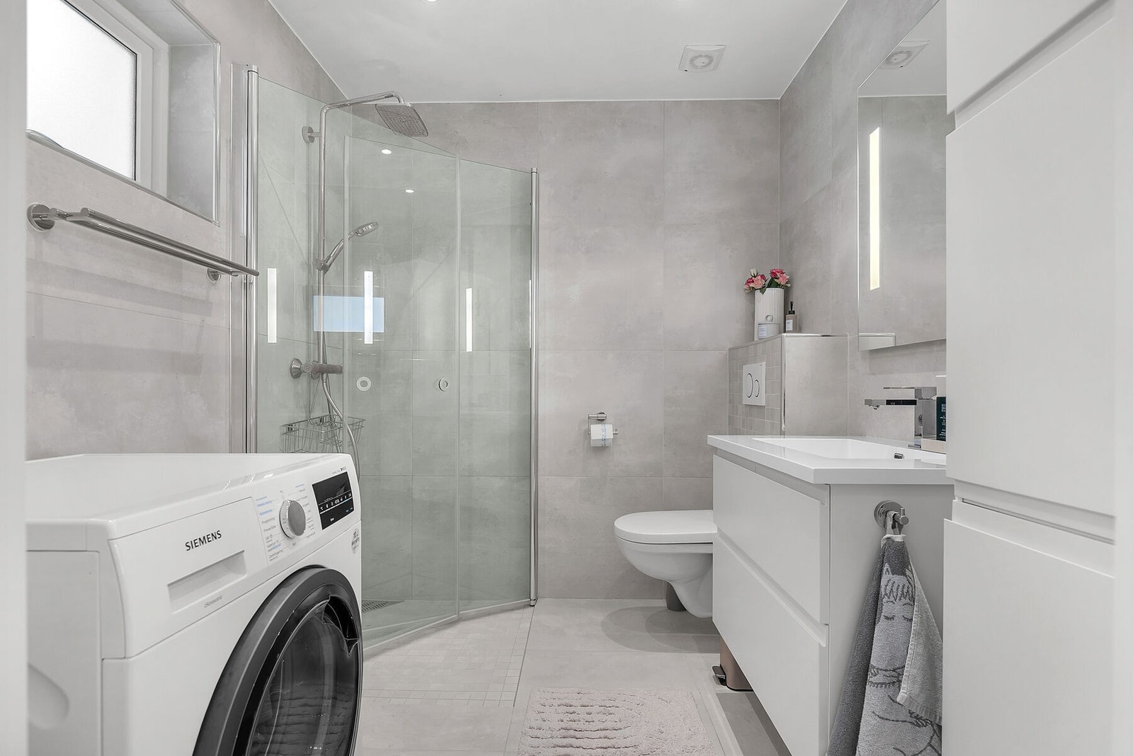 Flislagt bad med varme i gulv. Galleribilde