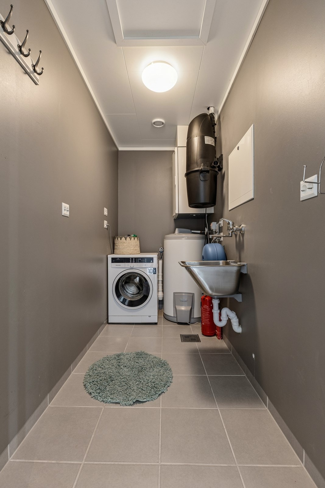 Bod med opplegg til vaskemaskin. Galleribilde