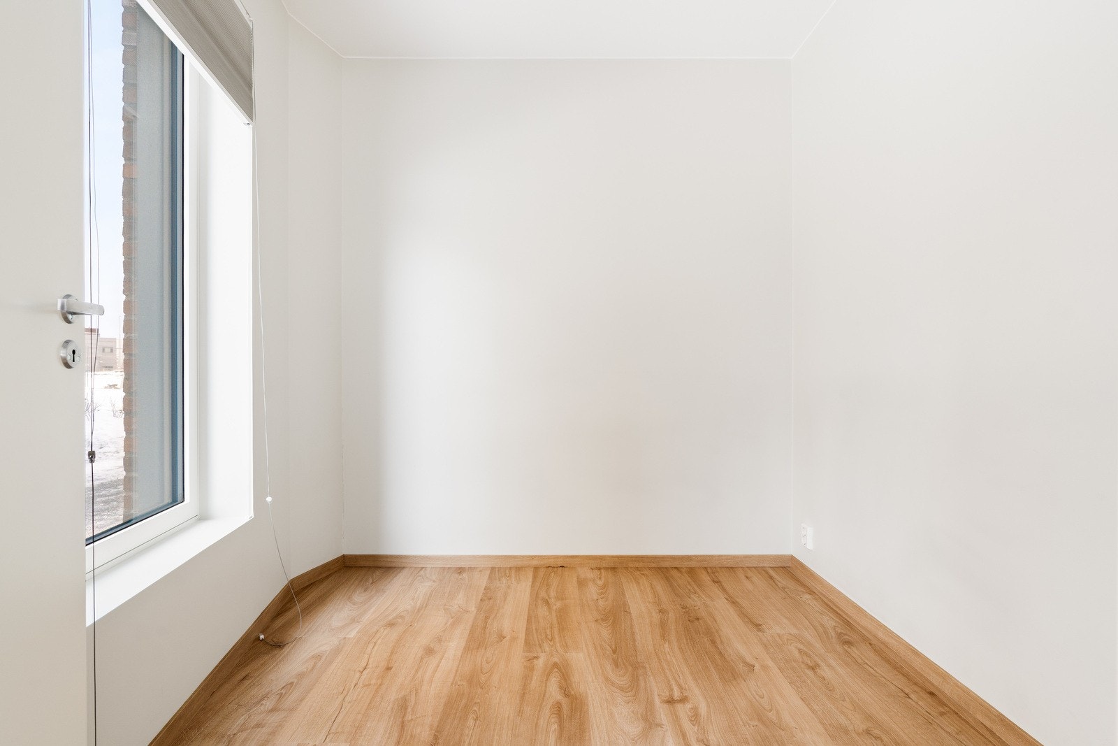 Soverom nummer 2 i boligen er på omtrent 6 kvm Galleribilde