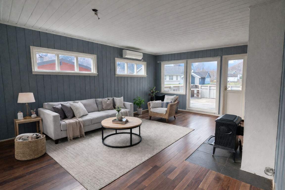 Dette bilde er redigert med KI, og er bere meint som ein illustrasjon av korleis stova kan sjå ut med møbler. Galleribilde