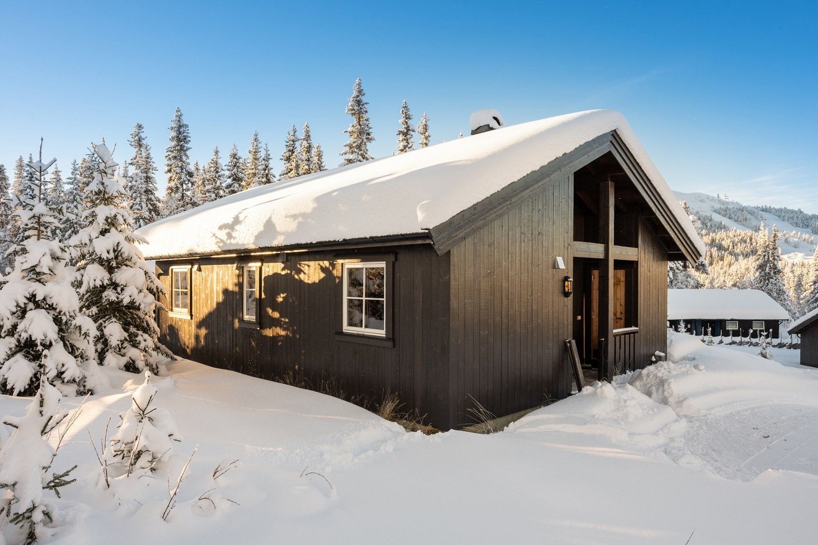 Fritidsboligen fra 2012 går over ett plan. Galleribilde