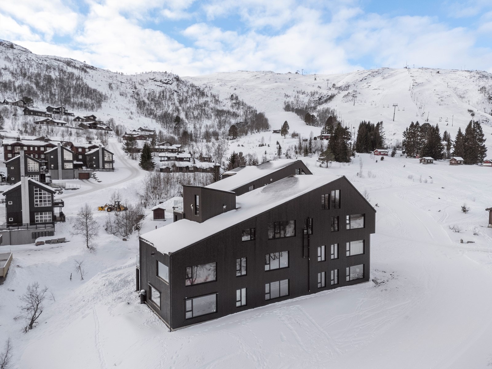 Leilighetene ligger i et område med gode fasiliteter for vintersport og rekreasjon. Galleribilde