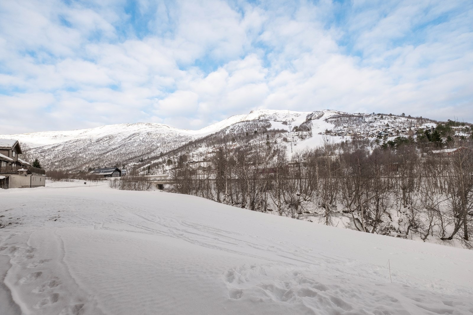 Åpne landskap med snødekte områder gir en følelse av romslighet og frihet. Galleribilde