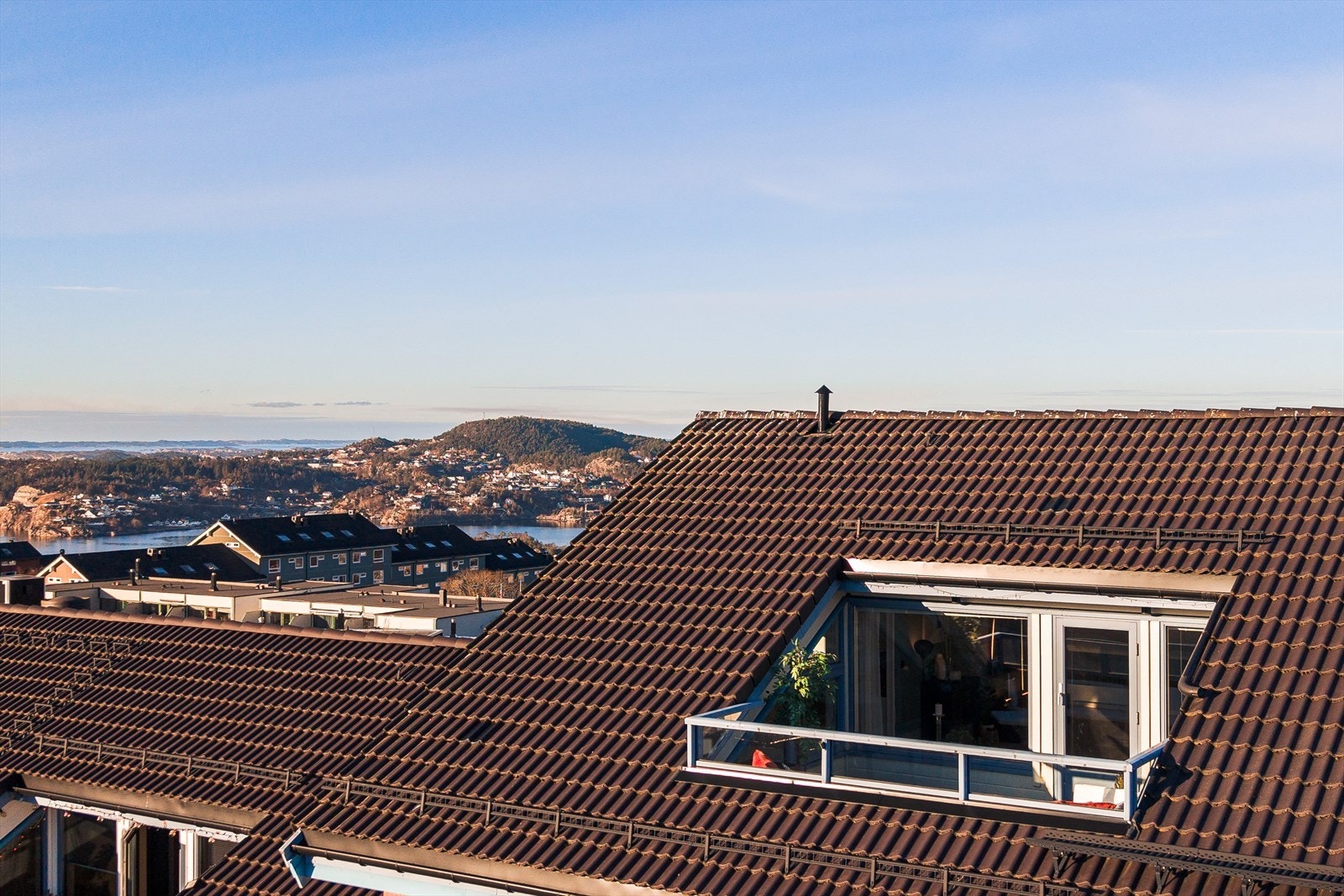 Her sitter du høyt hevet på din egen takterrasse Galleribilde