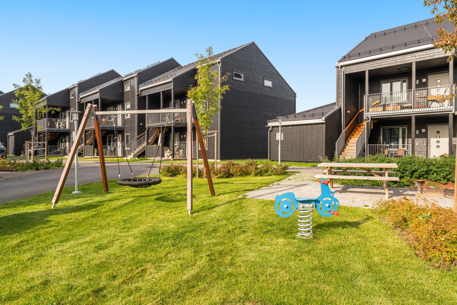 Det er flere lekeplasser i området. Galleribilde