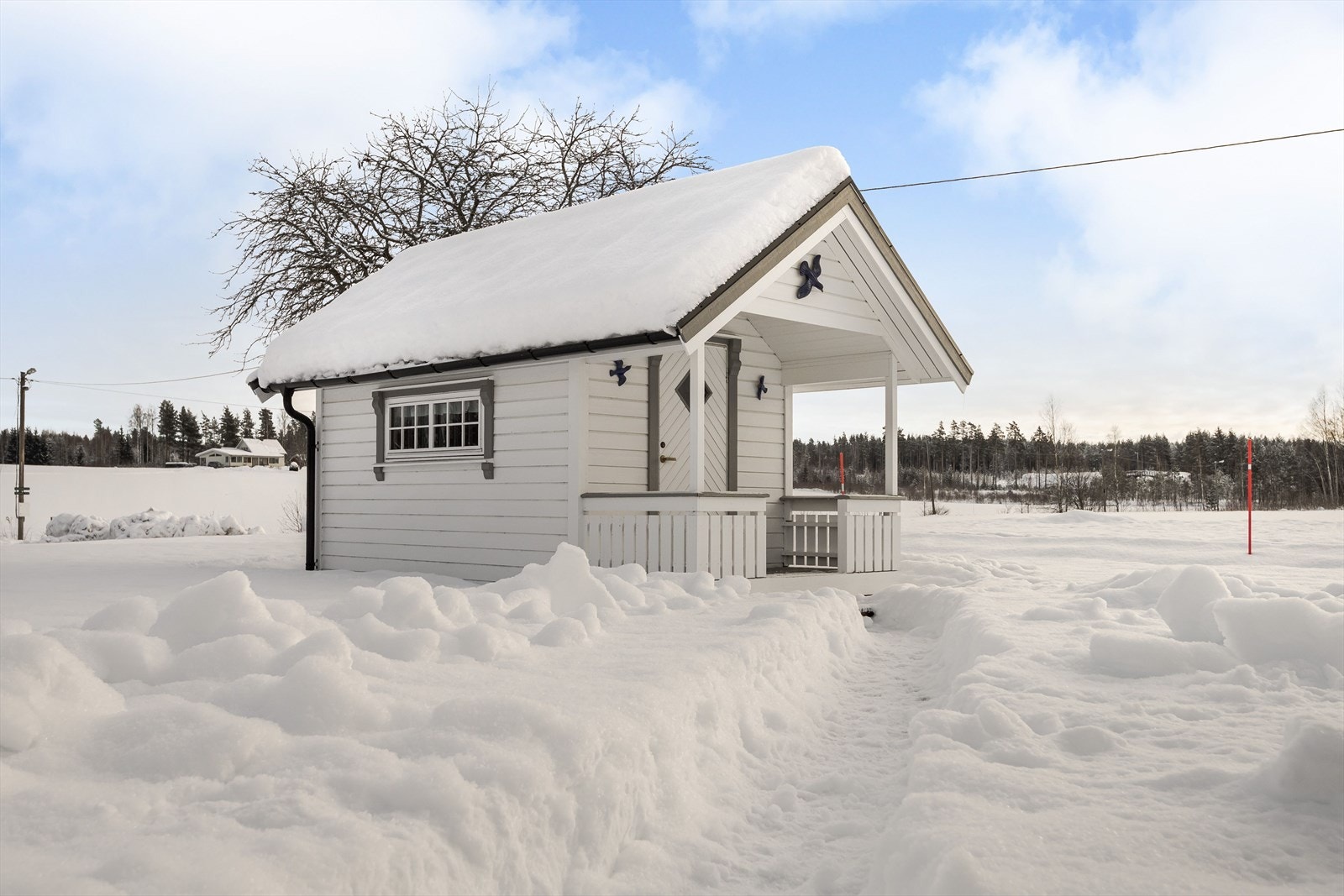 I hagen er det også en lekestue på 8m². Galleribilde