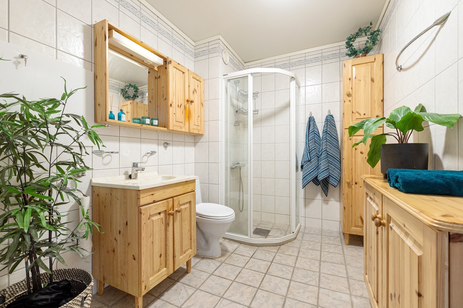 Flislagt bad med gulvvarme. Galleribilde