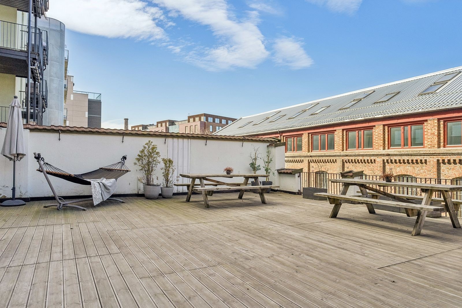 Sameiet har felles takterrasse som kan brukes av beboerne. Galleribilde