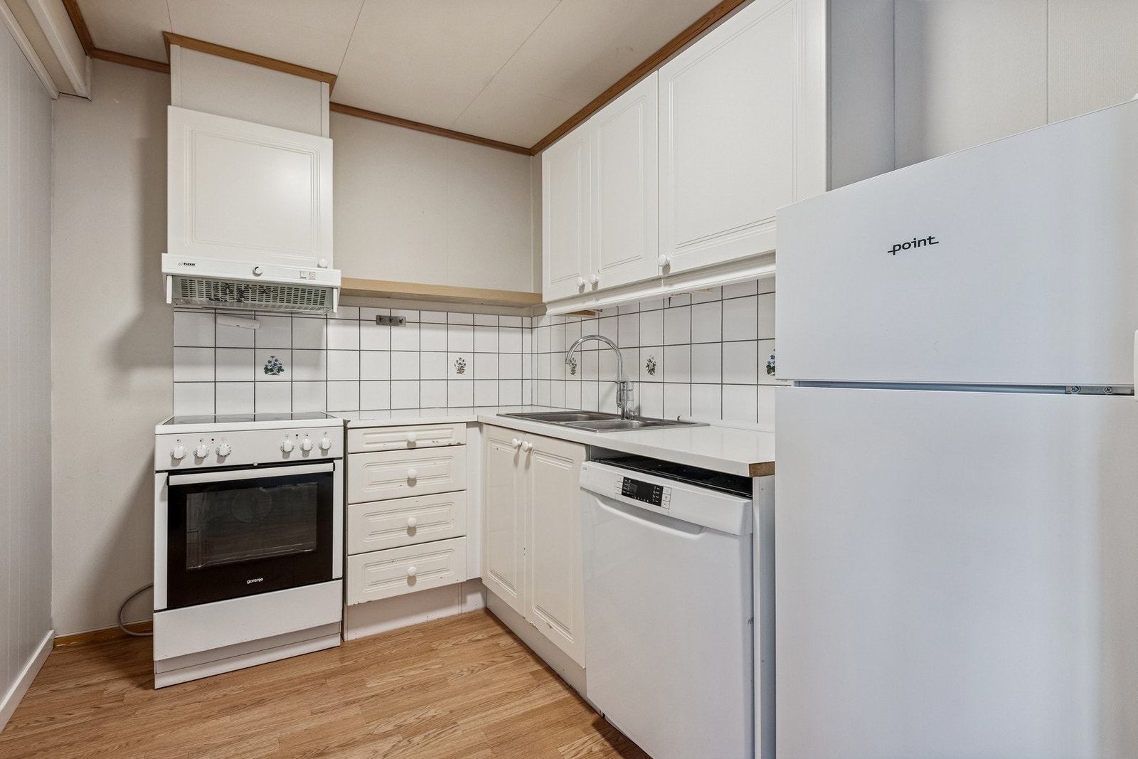 Kjøkken med avsatt plass til hvitevarer. Galleribilde