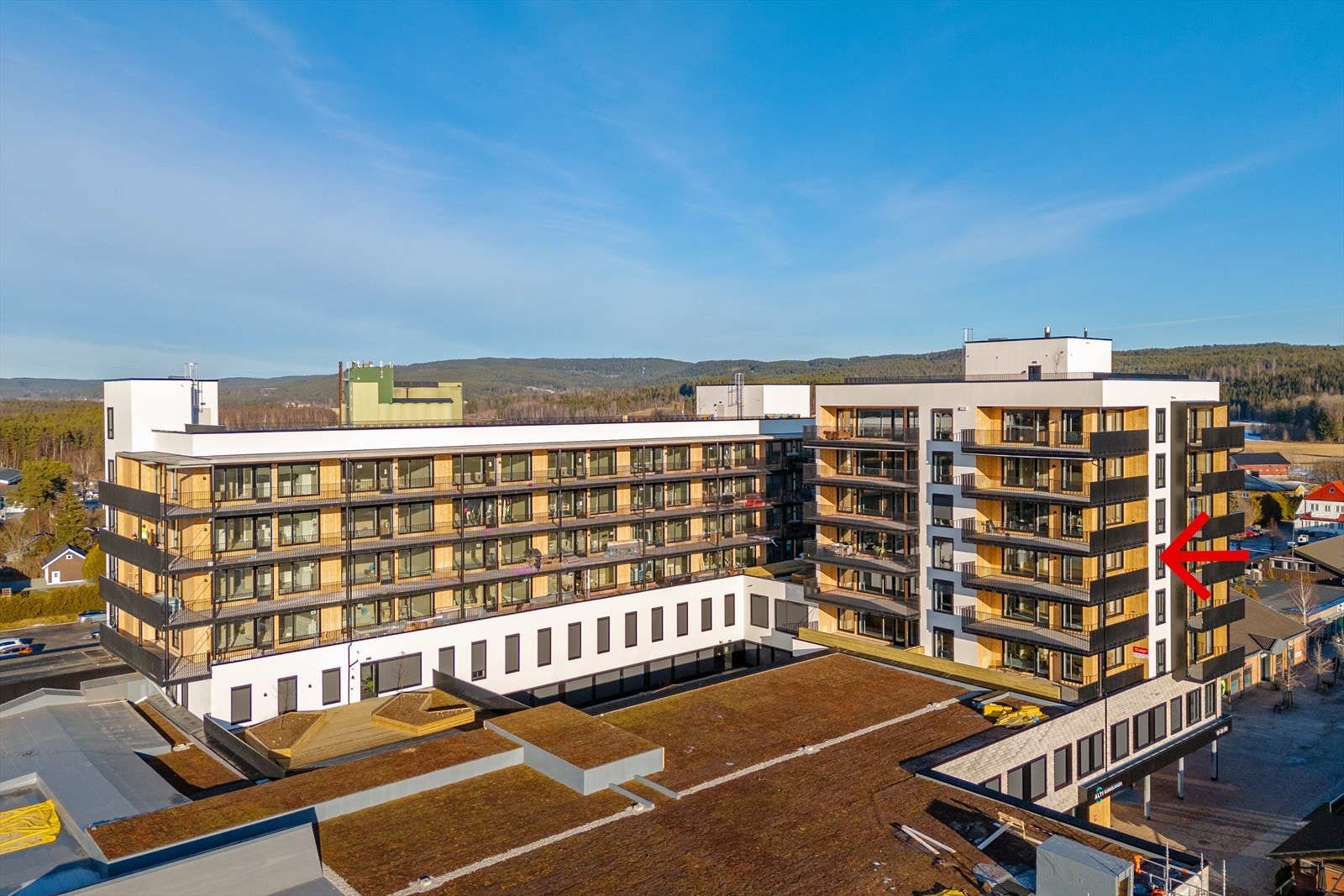 Pilen viser leilighetens fine plassering i blokka Galleribilde