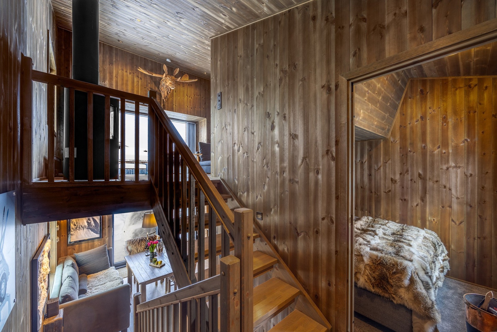 Et halvplan opp ligger soverommet. Galleribilde