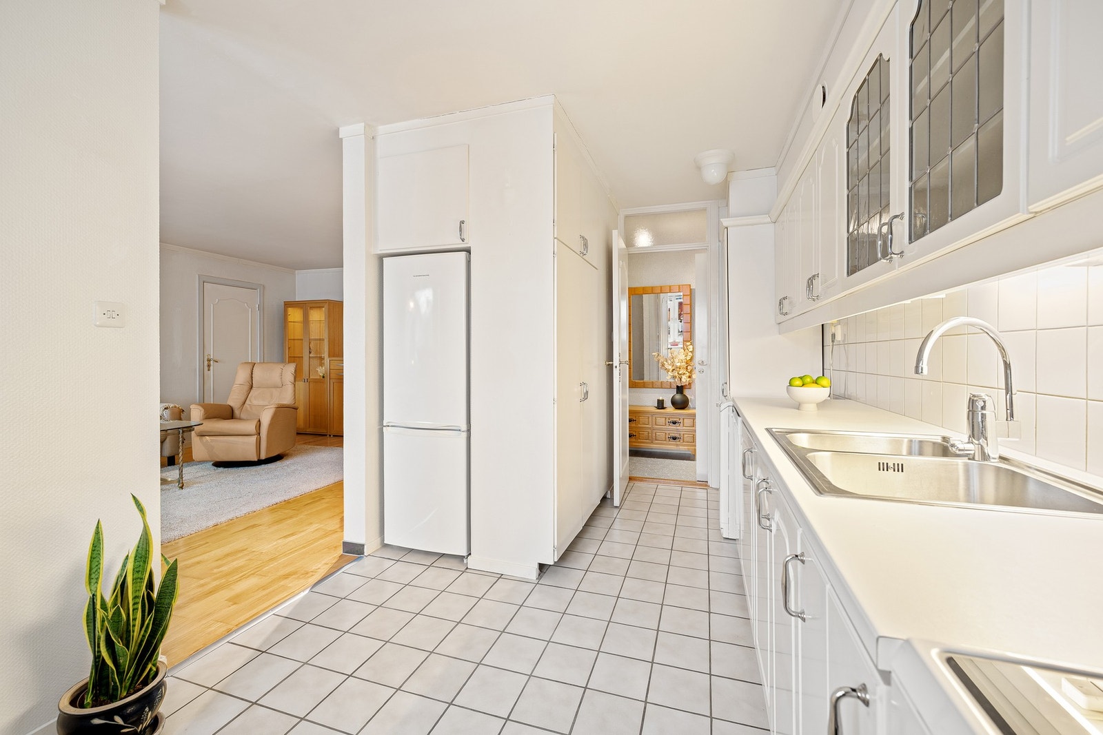 Kjøkkenet har hått TG 1 av takstmann og fremstår med flislagt gulvflate over gulvvarme. Galleribilde