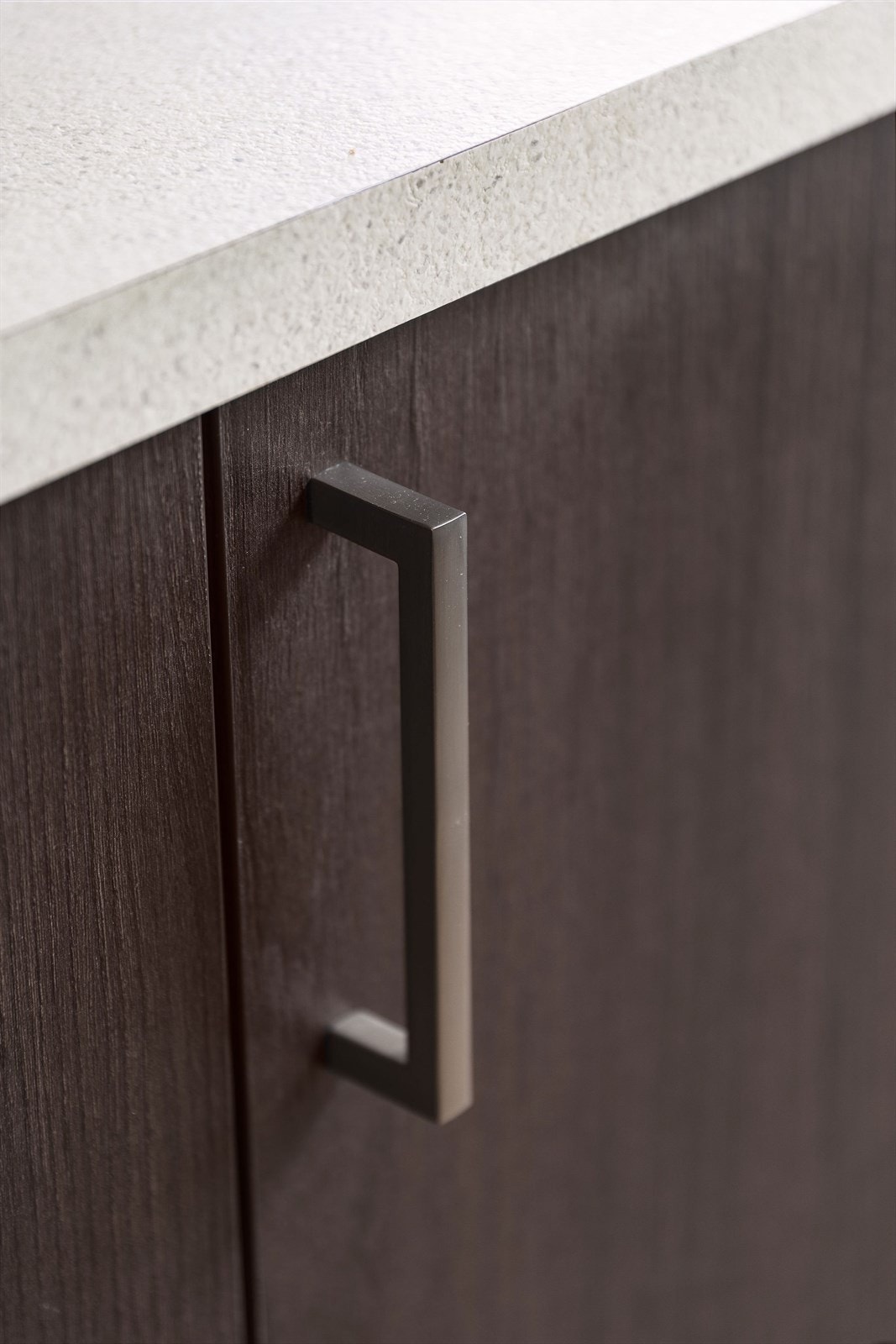 Norema kjøkkeninnredning med slette fronter og benkeplate av laminat. Galleribilde