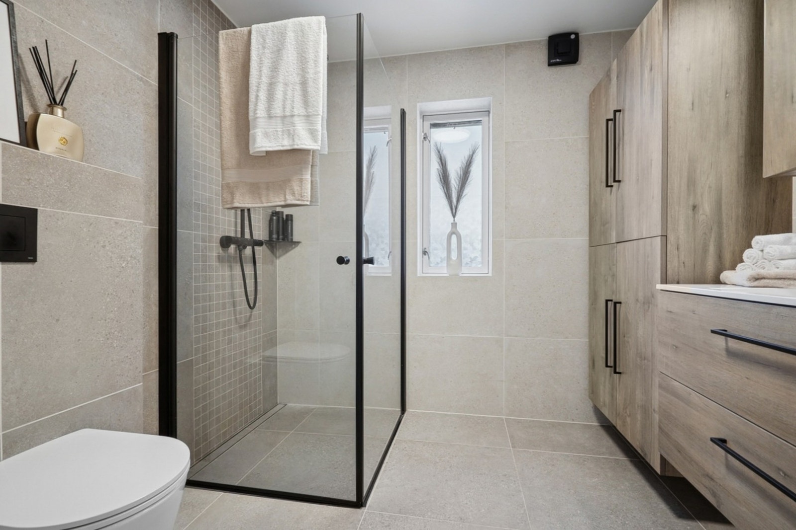 Helfliset bad på 5 kvm med gulvvarme. Galleribilde