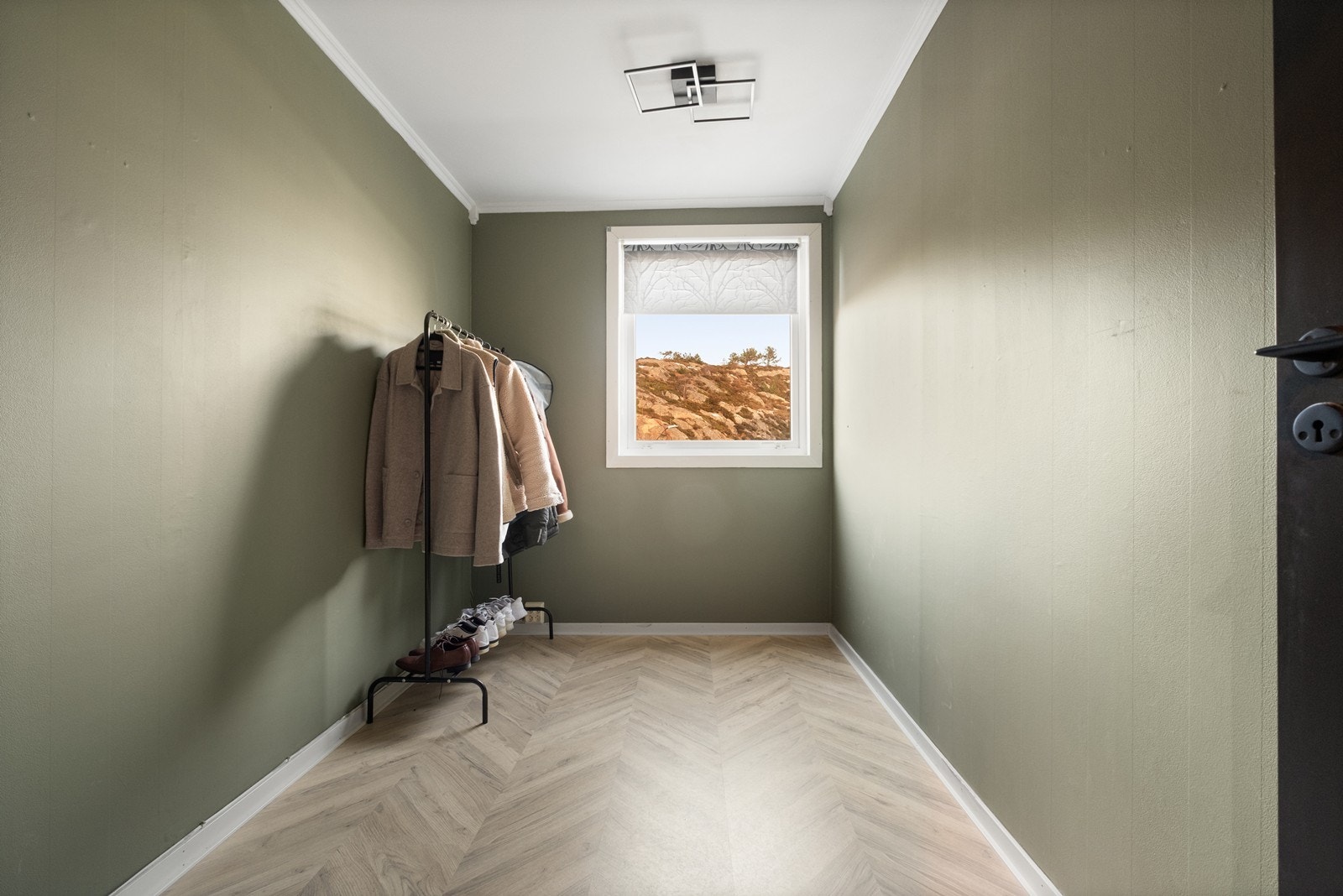 Det ekstra soverommet er perfekt størrelse for et barnerom, gjesterom eller hjemmekontor. Galleribilde