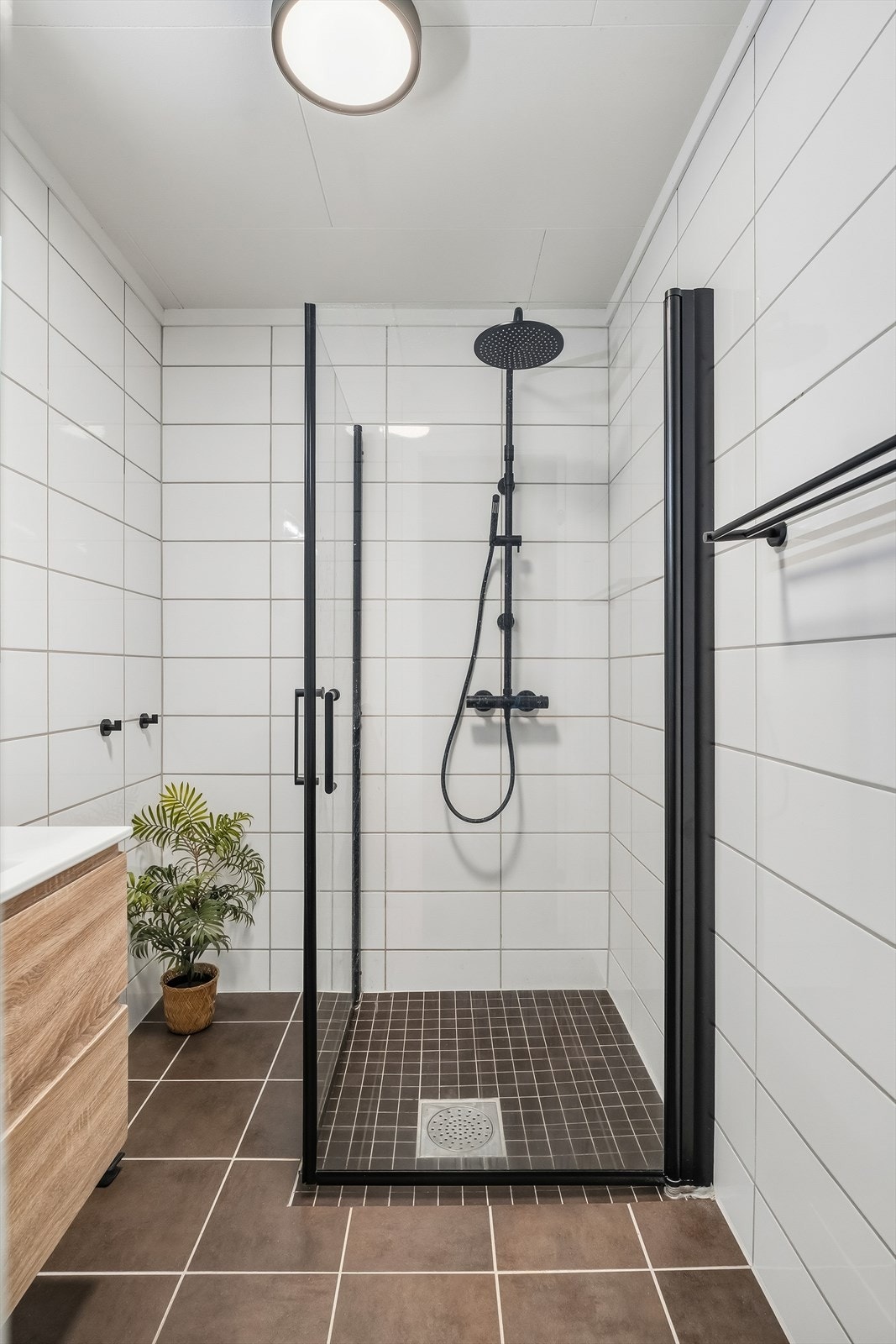 Flislagt baderom med varme i gulv. Galleribilde