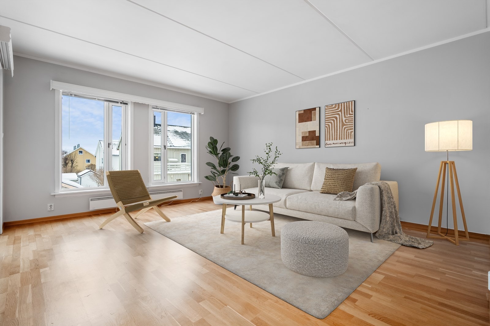 Romslig stue med god plass for flere sitte soner. ( Fotograf Tom Antonsen) Digital bilde for inspirasjon av stua. Galleribilde