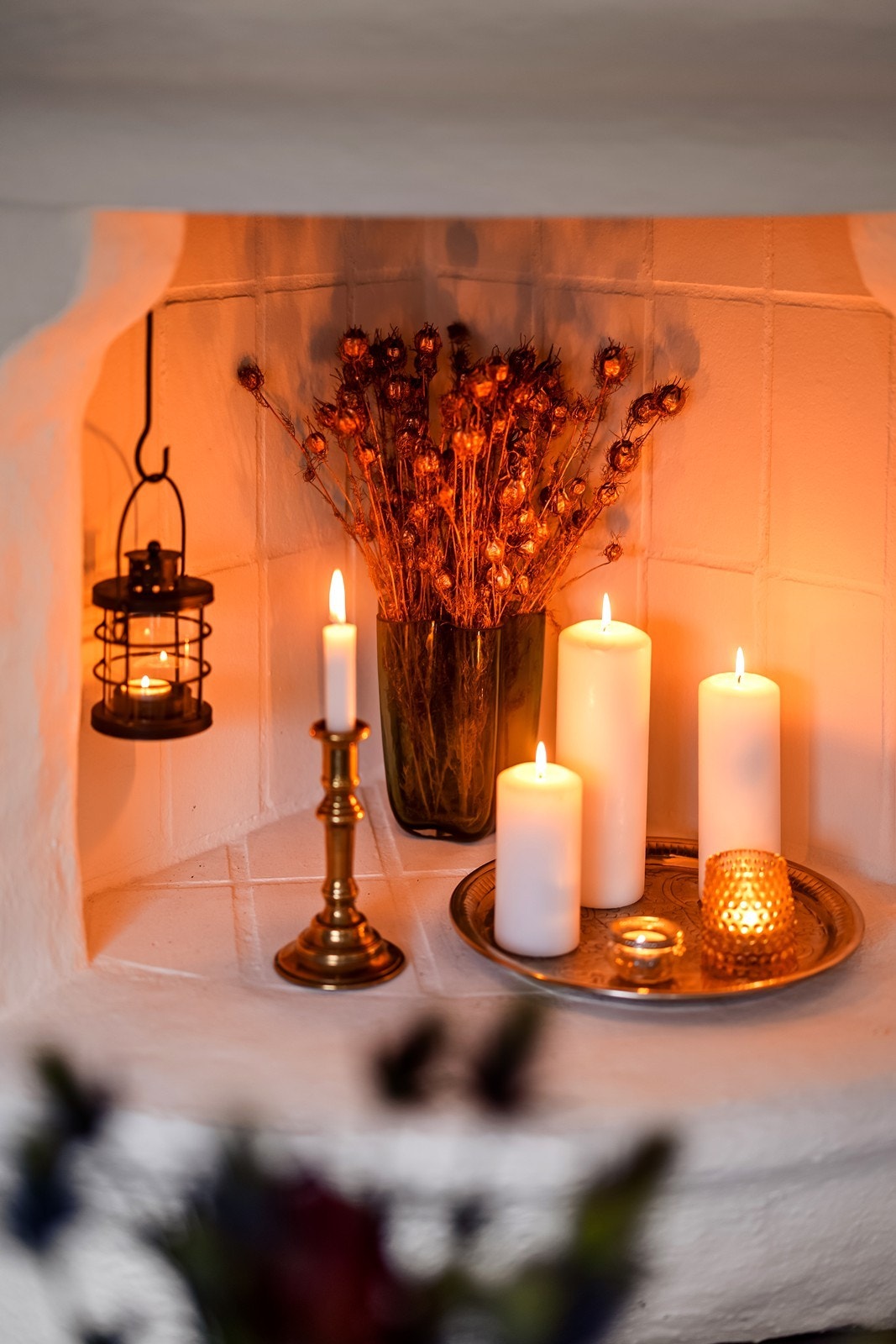 Detaljene rundt ildstedet bidrar til kjøkkenets unike karakter. Galleribilde