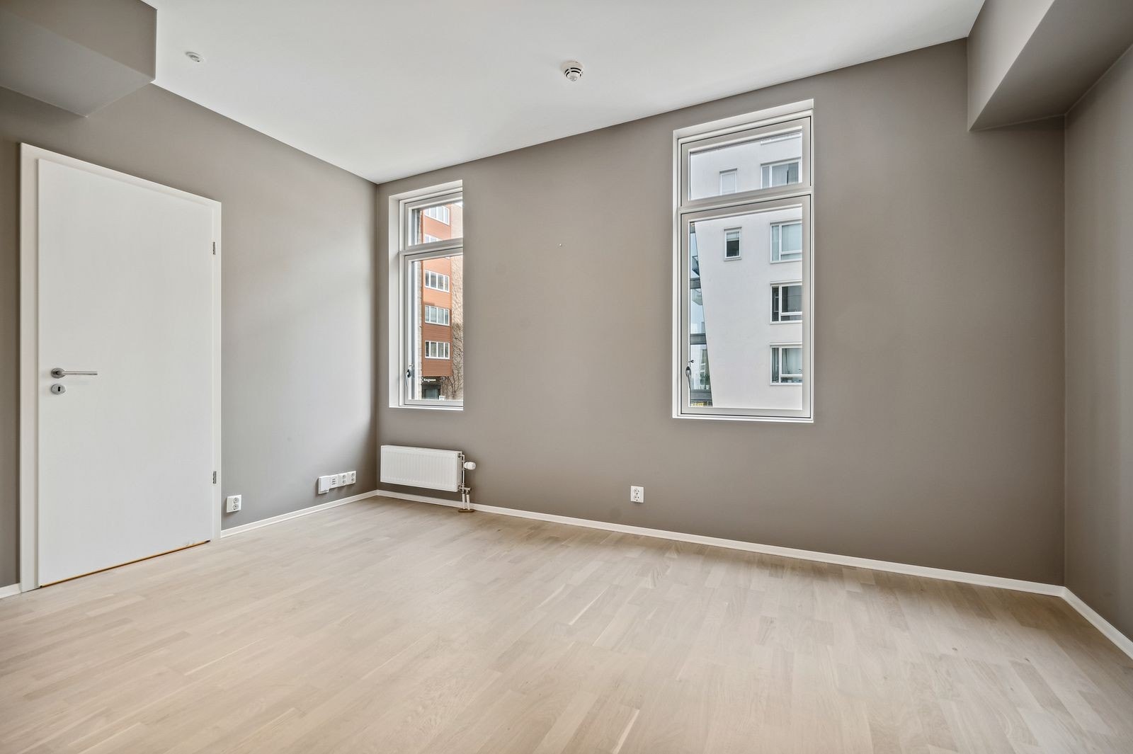 Dette er en pen og moderne 1-roms malt i tidsrikktige farger. Galleribilde