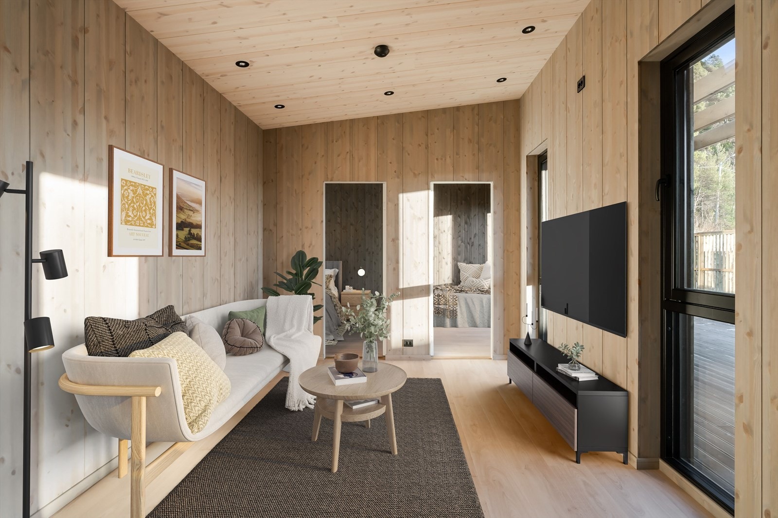 Det er store vindusflater i boligen og det er lagt panel på vegger levert fra Norsk Limtre. Galleribilde