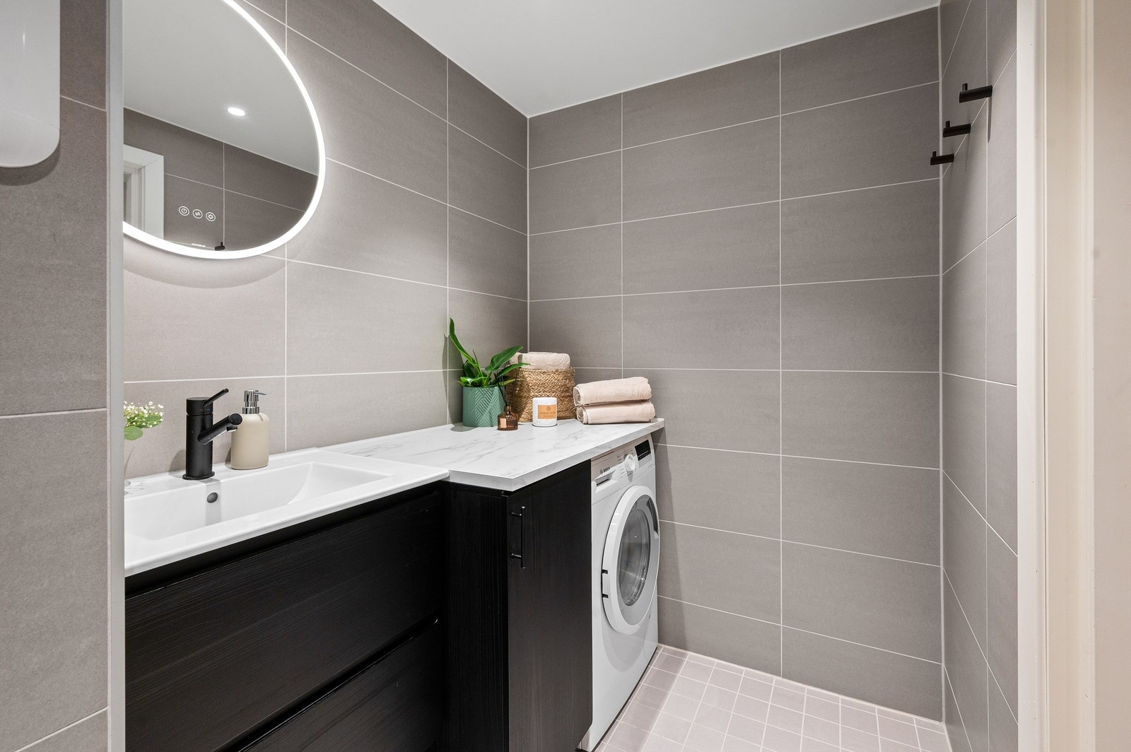 Det er opplegg for vaskemaskin. Galleribilde