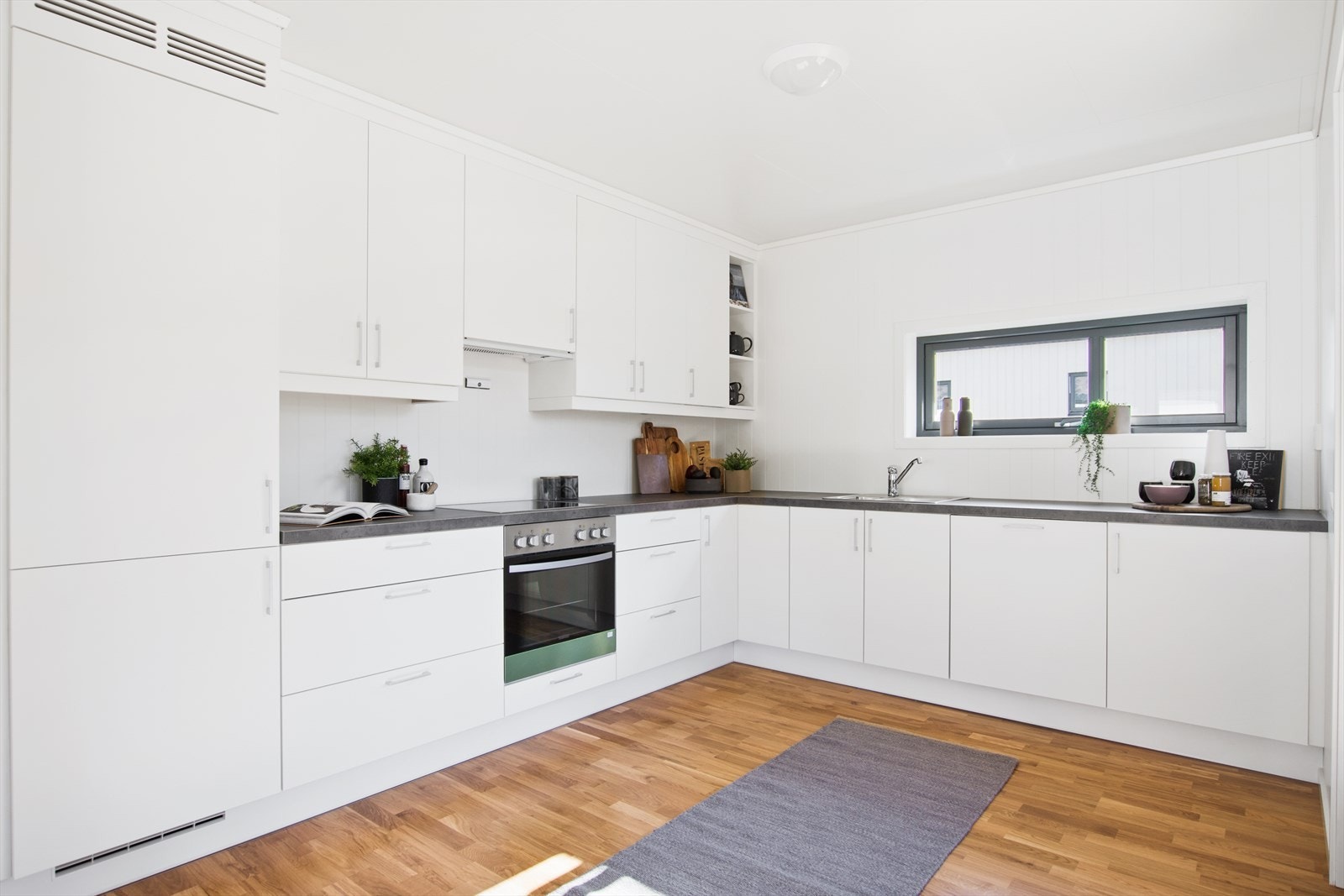 Slik kan ditt kjøkken se ut når du har flyttet inn. (Bildet er fra en tilsvarende leilighet levert av Gauldal Utbygging.) Galleribilde