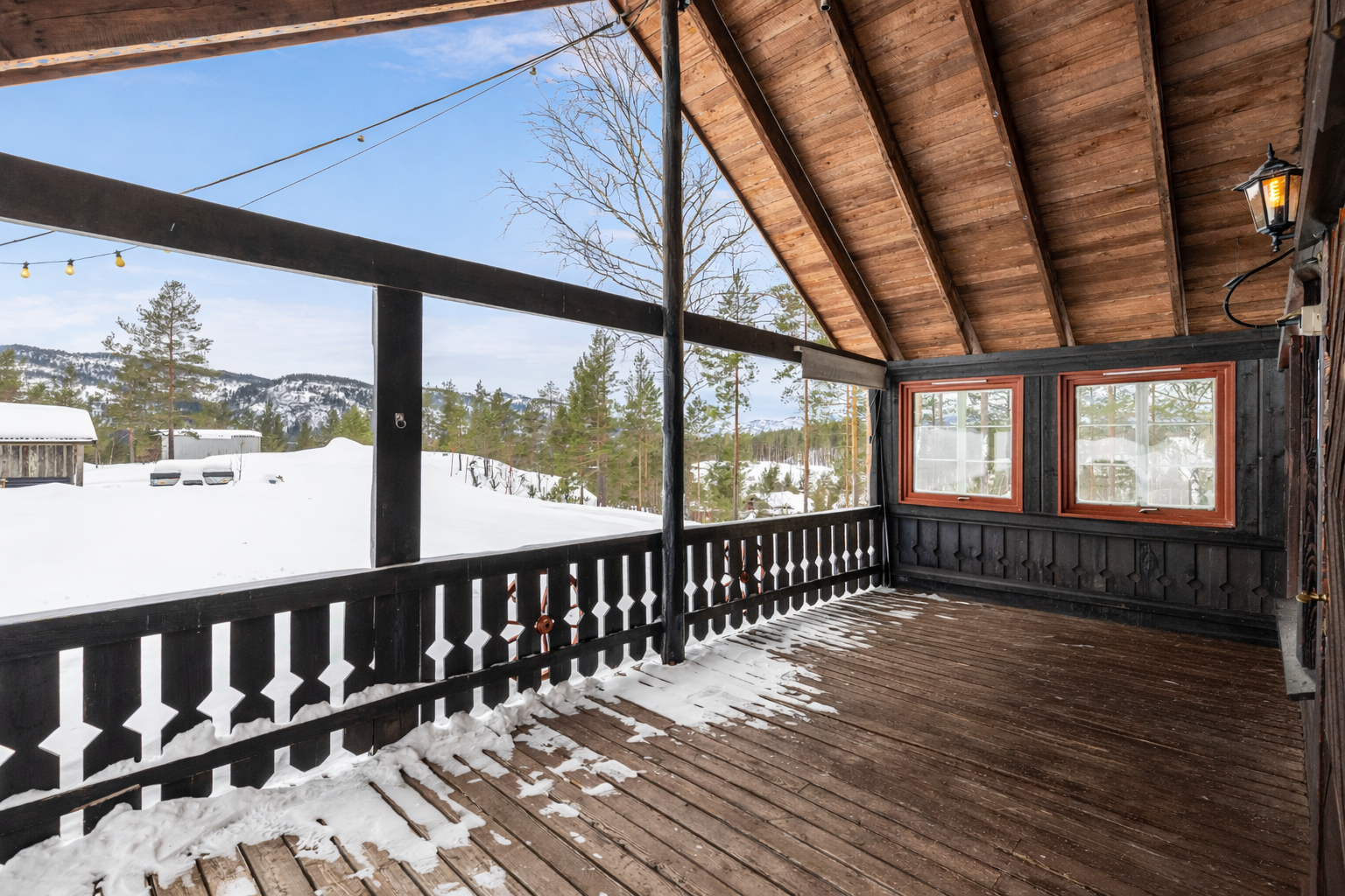 Hyggelig uteplass på den overbygde terrassen Galleribilde