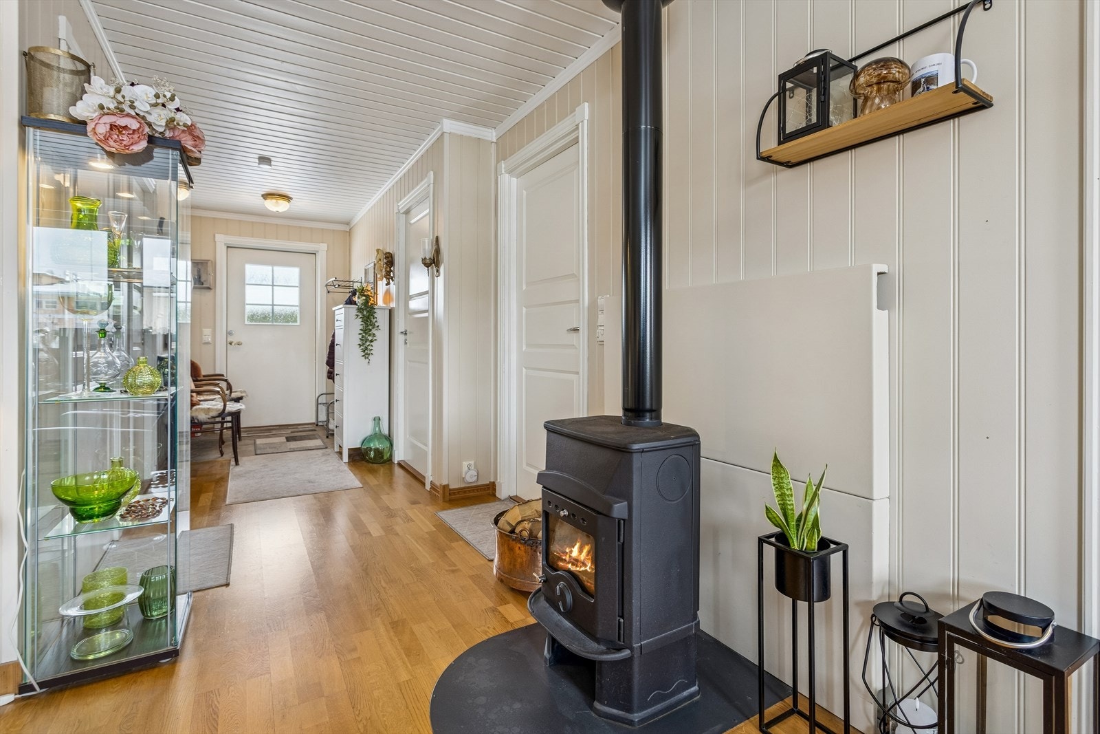 En sentralt plassert vedovn gir både ekstra varme og hygge på kalde dager. Galleribilde